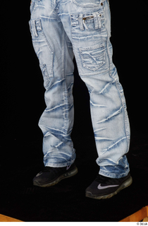 George Lee black sneakers blue jeans leg 0002.jpg